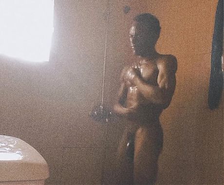 Take a cool shower with black African boy